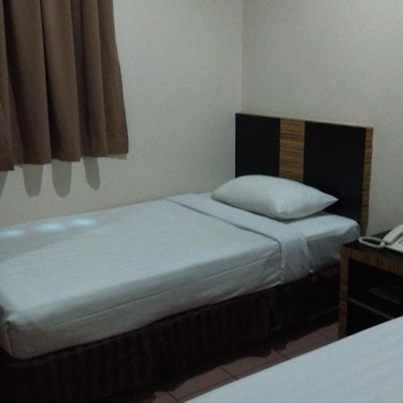 Hotel Traveller Kota Kinabalu Habitación foto