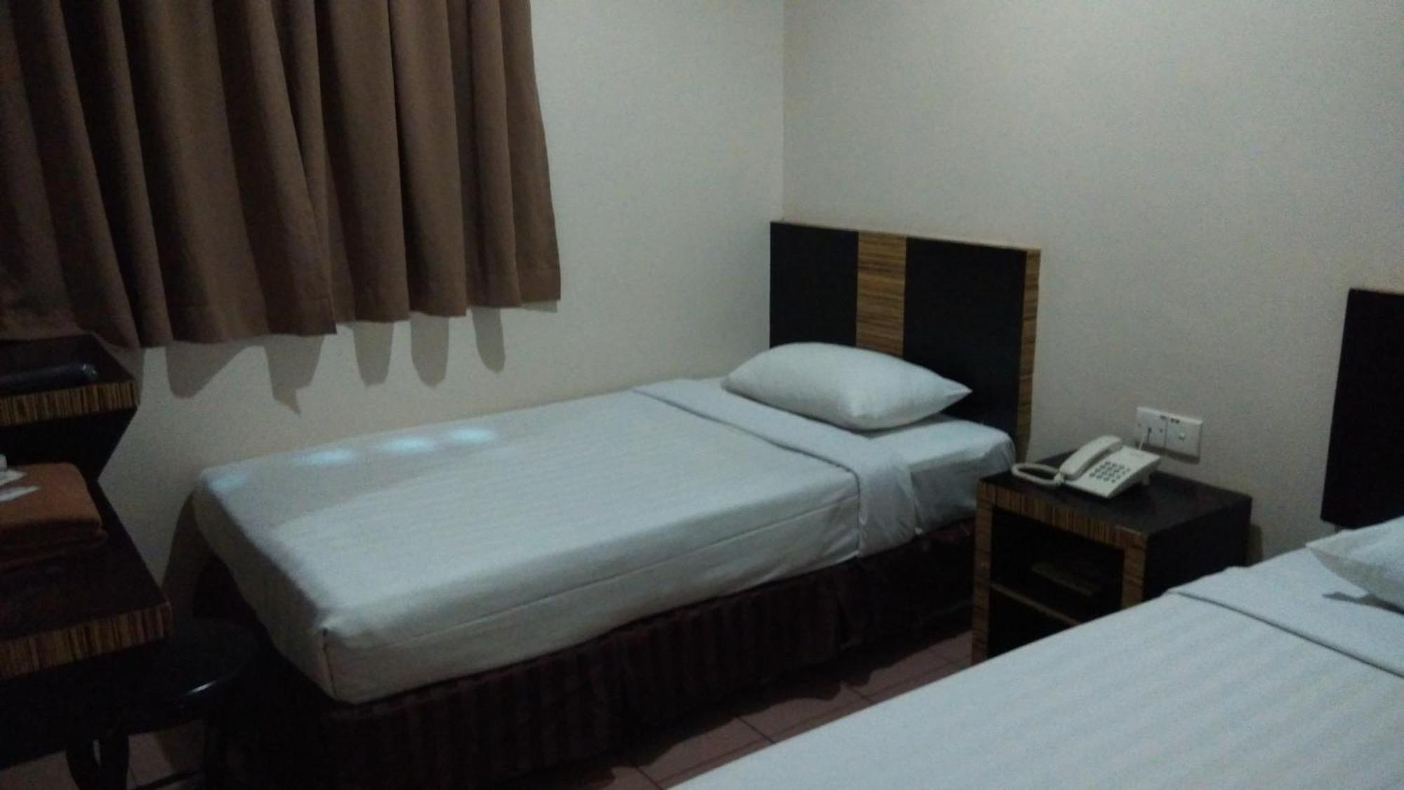 Hotel Traveller Kota Kinabalu Habitación foto