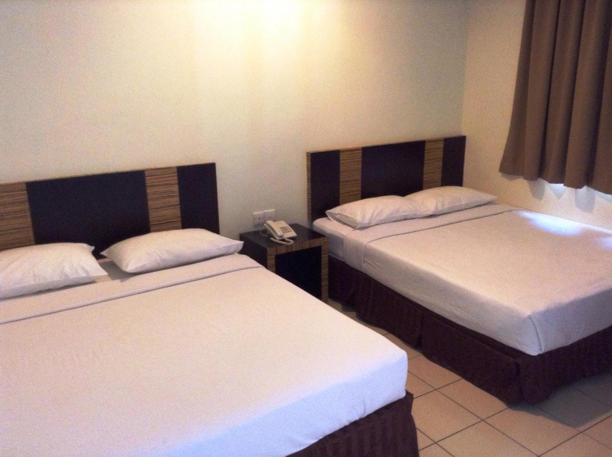 Hotel Traveller Kota Kinabalu Habitación foto