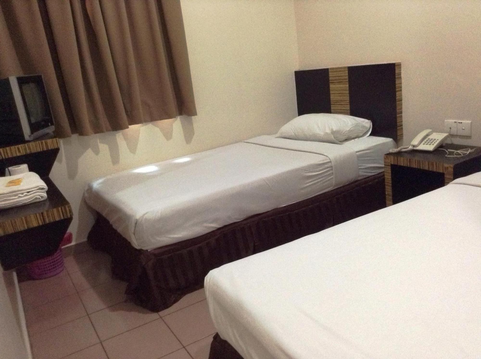 Hotel Traveller Kota Kinabalu Habitación foto