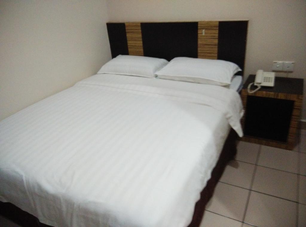 Hotel Traveller Kota Kinabalu Habitación foto