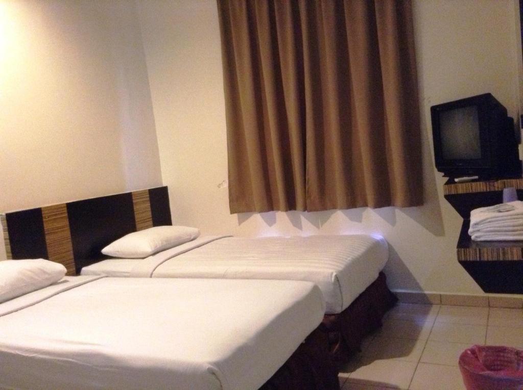 Hotel Traveller Kota Kinabalu Habitación foto