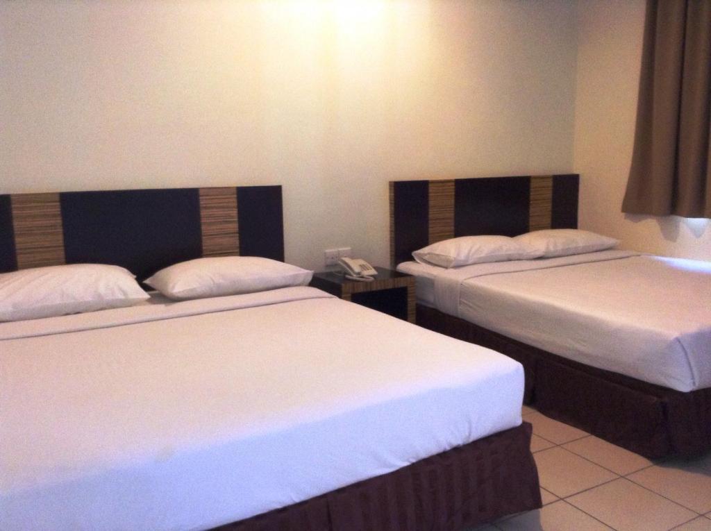 Hotel Traveller Kota Kinabalu Habitación foto